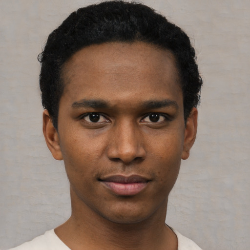 Neutral black young-adult male with short  black hair and brown eyes