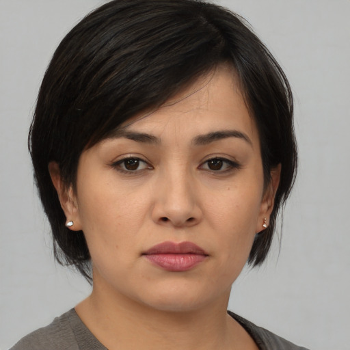 Neutral asian young-adult female with medium  black hair and brown eyes