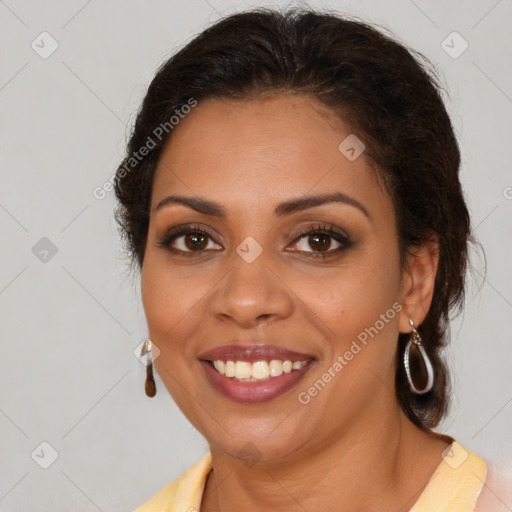 Joyful latino young-adult female with medium  brown hair and brown eyes