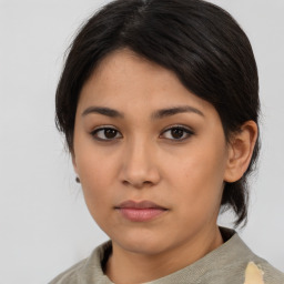 Neutral asian young-adult female with medium  brown hair and brown eyes