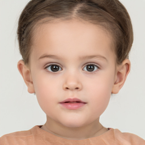 Neutral white child female with short  brown hair and brown eyes