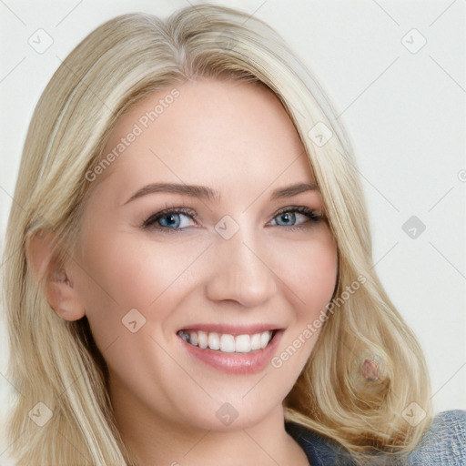 Joyful white young-adult female with long  brown hair and blue eyes