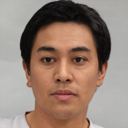 Neutral asian young-adult male with short  black hair and brown eyes