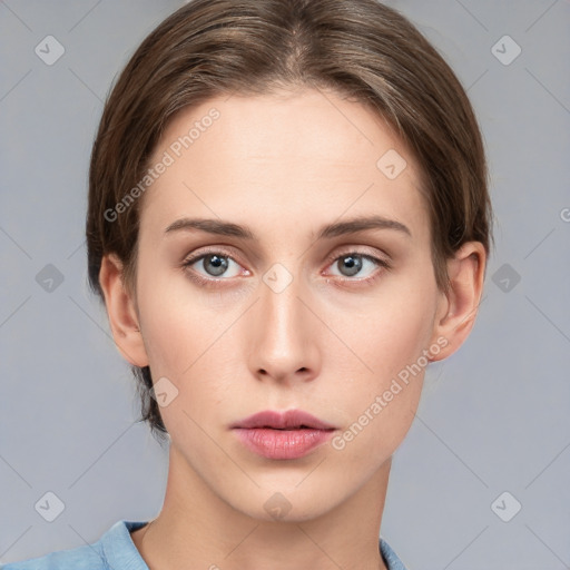 Neutral white young-adult female with medium  brown hair and grey eyes