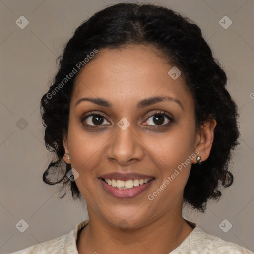 Joyful black young-adult female with medium  brown hair and brown eyes