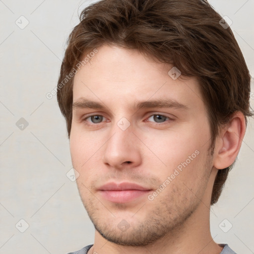 Neutral white young-adult male with short  brown hair and grey eyes