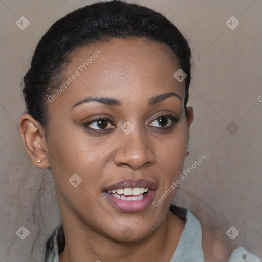 Joyful black young-adult female with short  brown hair and brown eyes