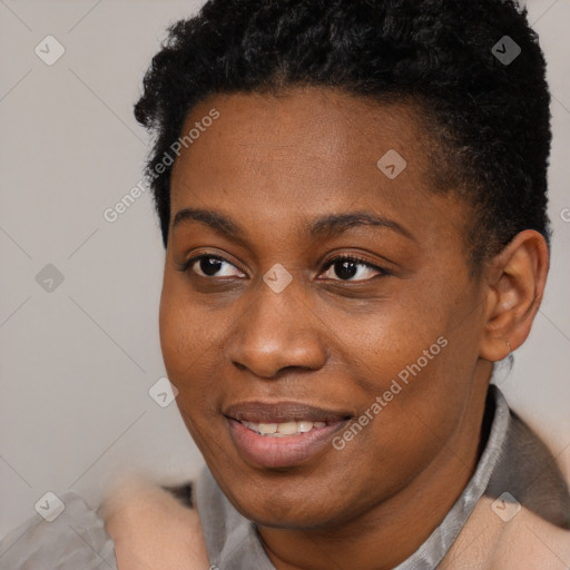 Joyful black young-adult female with short  black hair and brown eyes