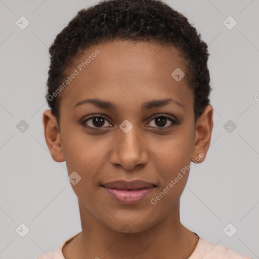 Joyful black young-adult female with short  brown hair and brown eyes