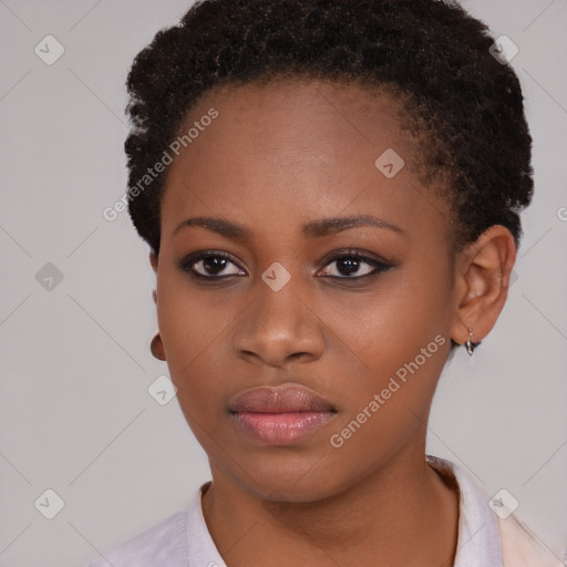 Neutral black young-adult female with short  brown hair and brown eyes