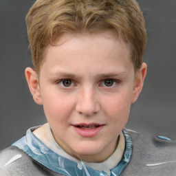 Joyful white child male with short  brown hair and grey eyes