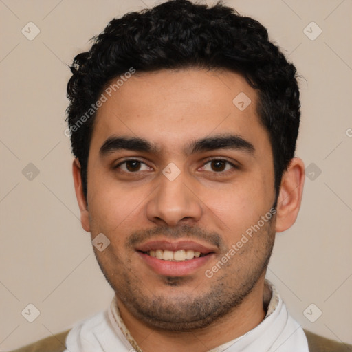 Joyful latino young-adult male with short  black hair and brown eyes