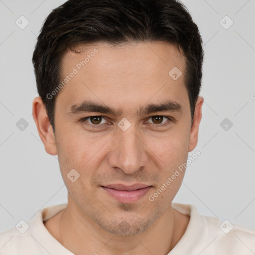 Joyful white young-adult male with short  brown hair and brown eyes