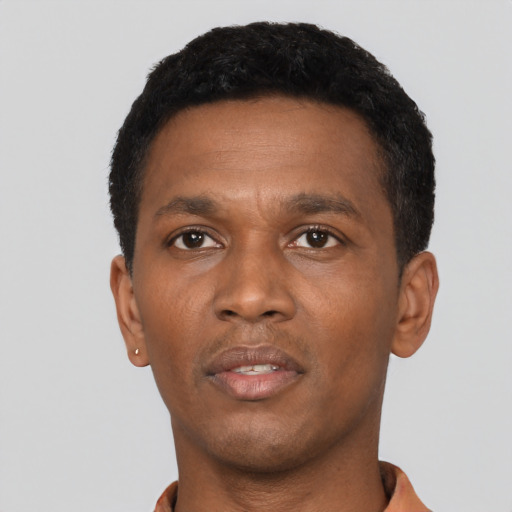 Neutral black young-adult male with short  black hair and brown eyes