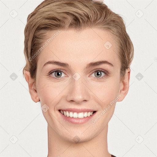 Joyful white young-adult female with short  brown hair and grey eyes