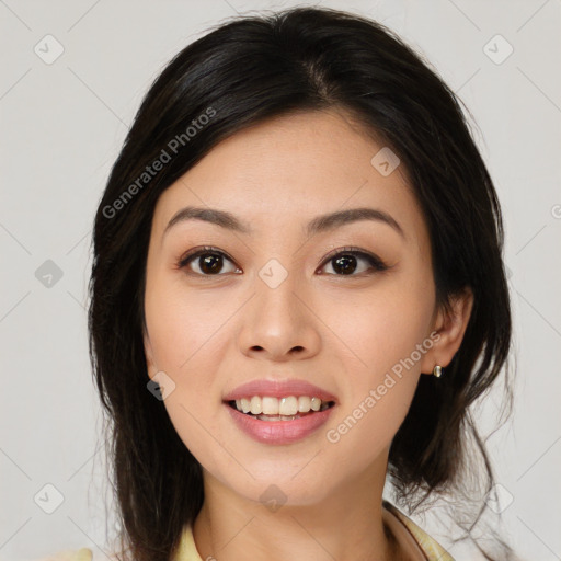 Joyful asian young-adult female with medium  brown hair and brown eyes