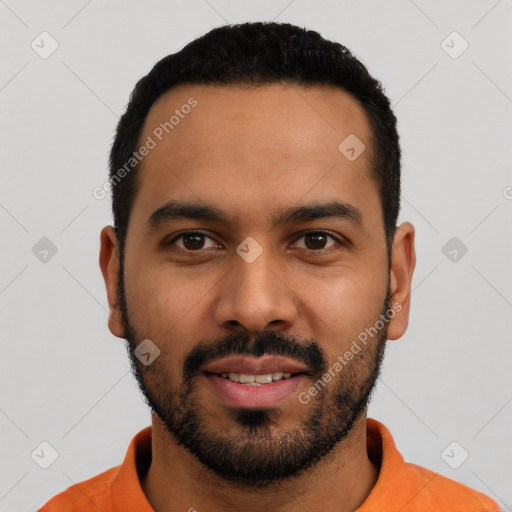 Joyful latino young-adult male with short  black hair and brown eyes