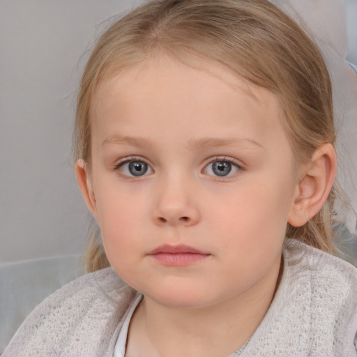 Neutral white child female with medium  brown hair and blue eyes