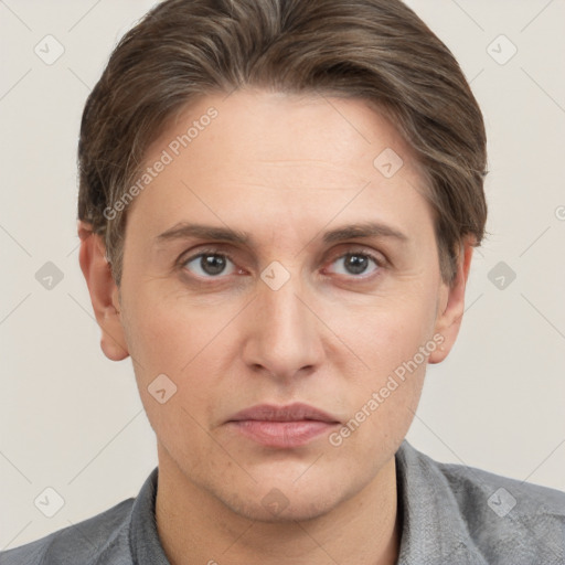 Joyful white adult female with short  brown hair and grey eyes