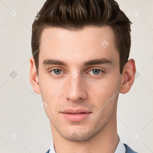 Neutral white young-adult male with short  brown hair and grey eyes