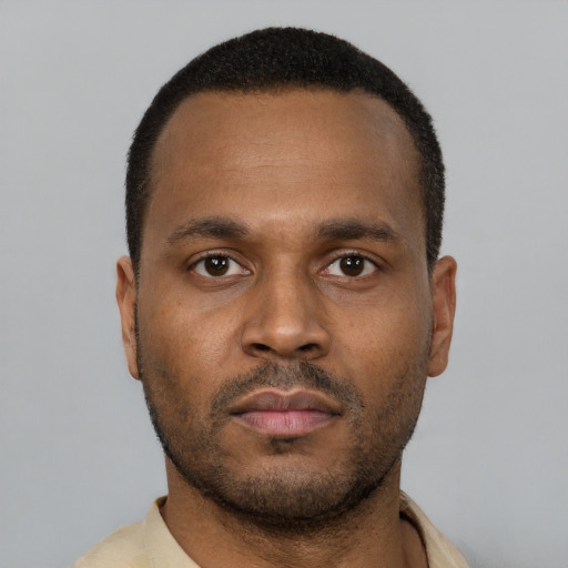 Neutral latino young-adult male with short  brown hair and brown eyes