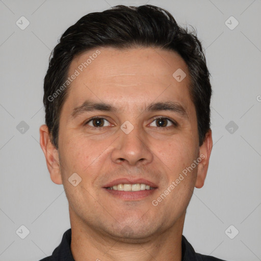 Joyful white adult male with short  brown hair and brown eyes