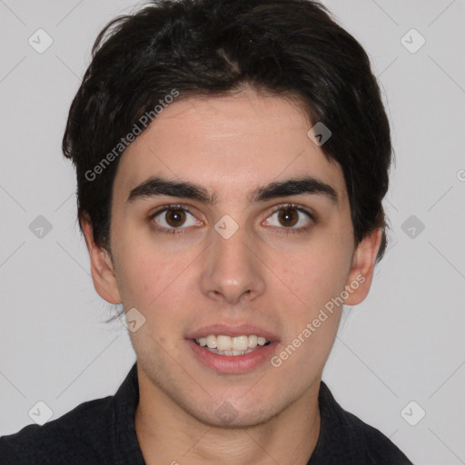 Joyful white young-adult male with short  black hair and brown eyes