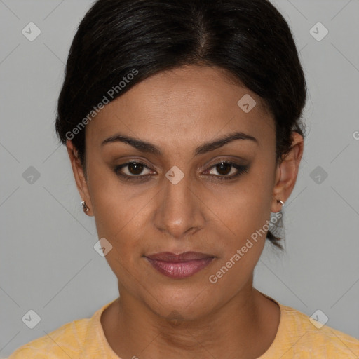 Joyful latino young-adult female with short  brown hair and brown eyes