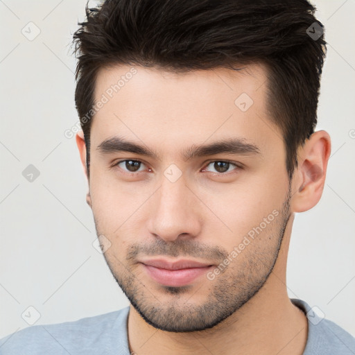 Neutral white young-adult male with short  brown hair and brown eyes