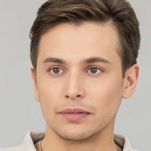 Neutral white young-adult male with short  brown hair and brown eyes