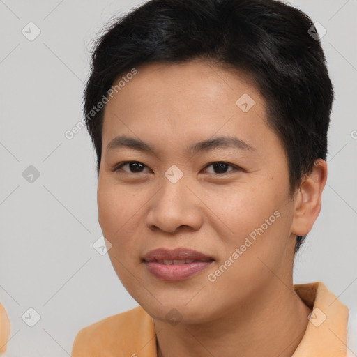 Joyful asian young-adult female with short  brown hair and brown eyes