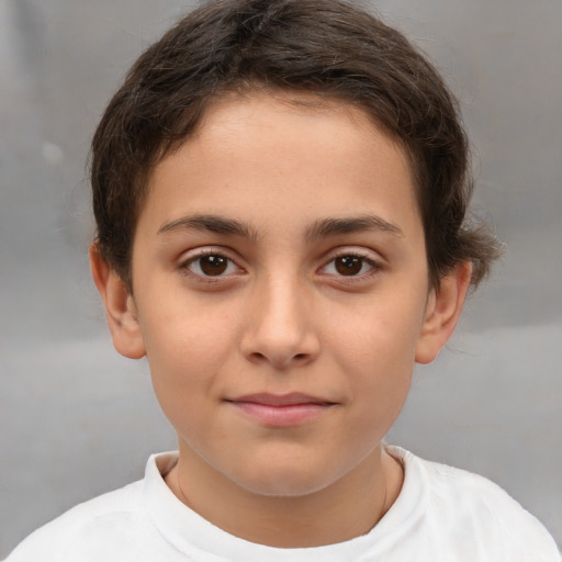 Joyful white child male with short  brown hair and brown eyes