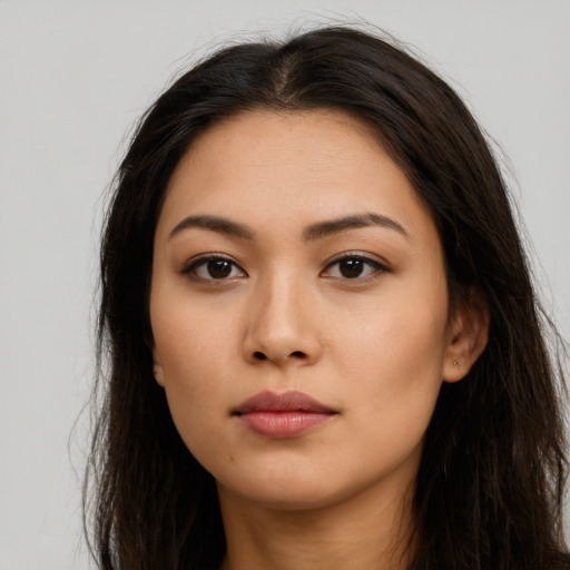 Neutral asian young-adult female with long  brown hair and brown eyes