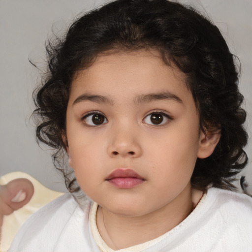 Neutral white child female with medium  brown hair and brown eyes