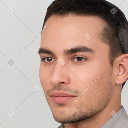 Neutral white young-adult male with short  brown hair and brown eyes