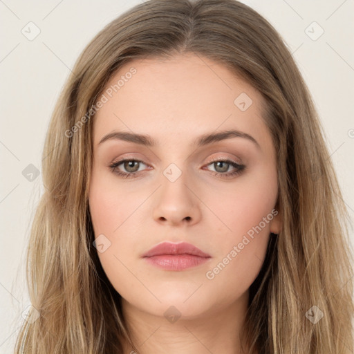 Neutral white young-adult female with long  brown hair and brown eyes