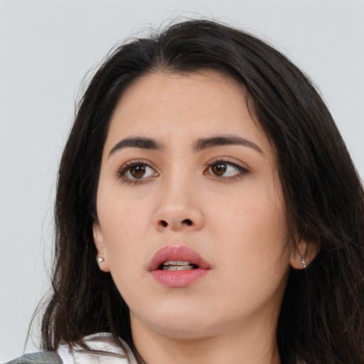 Neutral asian young-adult female with medium  brown hair and brown eyes