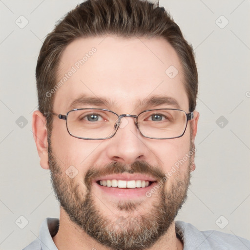 Joyful white adult male with short  brown hair and grey eyes