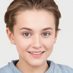 Joyful white child female with short  brown hair and brown eyes