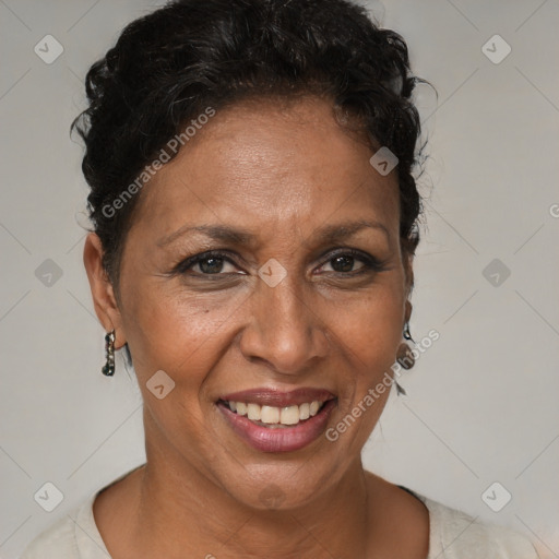 Joyful black adult female with short  brown hair and brown eyes