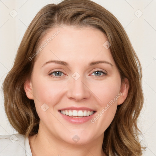 Joyful white young-adult female with medium  brown hair and green eyes