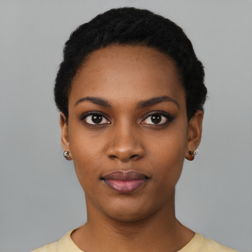 Neutral black young-adult female with short  black hair and brown eyes