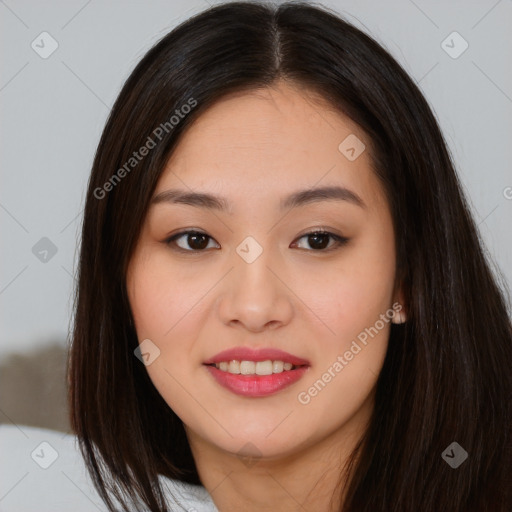 Joyful asian young-adult female with long  brown hair and brown eyes