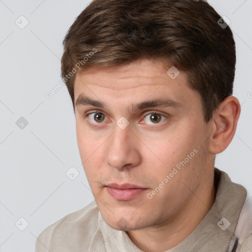 Neutral white young-adult male with short  brown hair and brown eyes