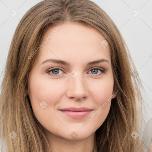 Joyful white young-adult female with long  brown hair and green eyes