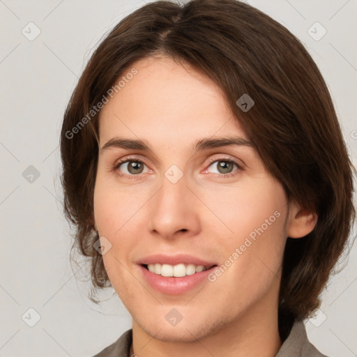 Joyful white young-adult female with medium  brown hair and green eyes