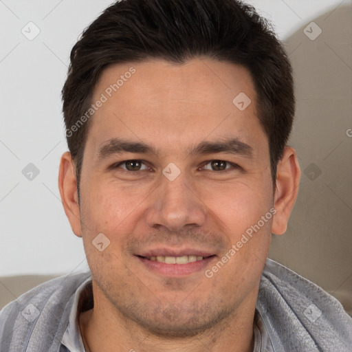 Joyful white adult male with short  brown hair and brown eyes