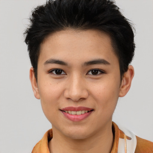 Joyful asian young-adult female with short  brown hair and brown eyes