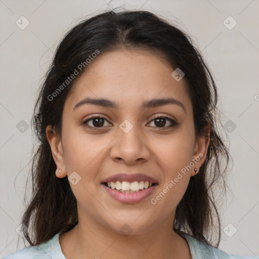 Joyful latino young-adult female with medium  brown hair and brown eyes