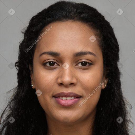 Joyful latino young-adult female with long  brown hair and brown eyes